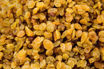 Raisins at the market close up. Selective focus. Healthy food concept