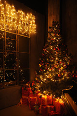 Evening christmas with christas tree and many gift box near piano