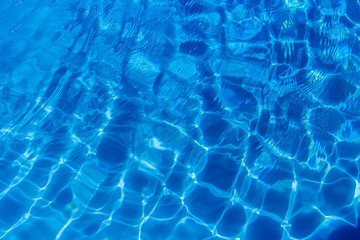 Clear blue water in swimming pool