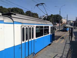Tram blue and white and sky blue