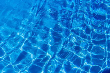 Clear blue water in swimming pool