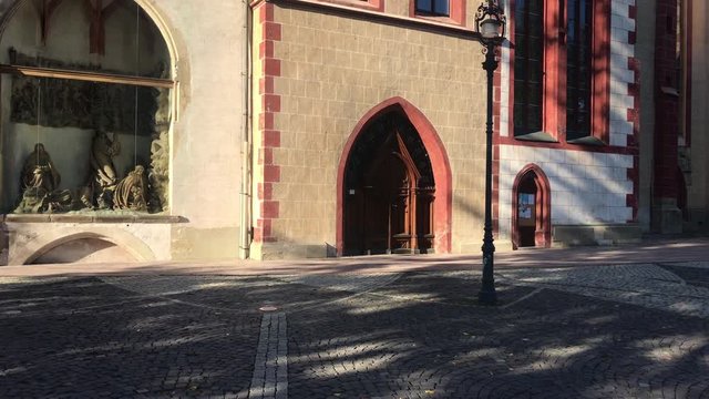 Tourist attraction in Banska Bystrica, Slovakia - Church of the Assumption of the Blessed Virgin Mary. Old gothic church. Exterior in sunny day. Parish church.