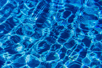 Clear blue water in swimming pool