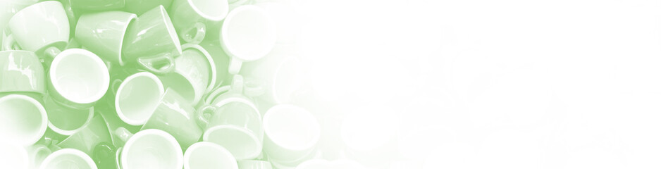 Heap of soft color green cups for espresso coffee - concept of coffee addiction and crockery products