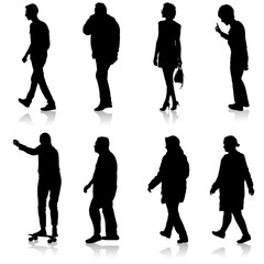 Black silhouette group of people standing in various poses