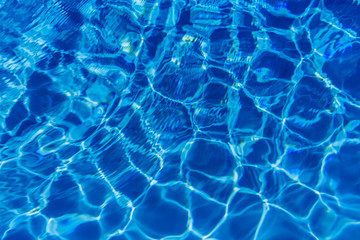 Clear blue water in swimming pool