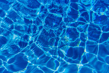 Clear blue water in swimming pool