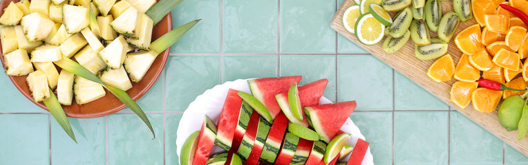 Fresh colorful fruits on plates