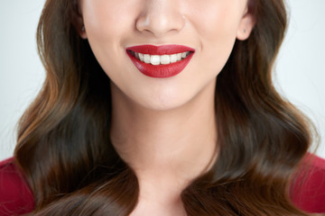 Female lips closeup. Beautiful smile of young fresh woman.