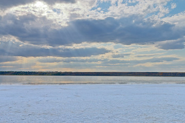 Salt estuary shore on a summer cloudy day.