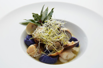 monkfish and clam chowder with bean sprouts purple potatoes