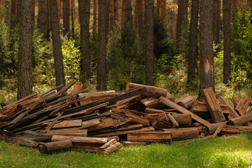 A pile of old wood from house building. Wood recycling. Eco environment concept. 