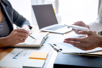 Professional Executive business team brainstorming on meeting to planning investment project working and strategy of business making conversation with partner and consultation of collaboration