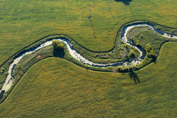 banks of a swampy river, aerial view
