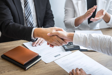 Successful job interview, Image of Boss employer committee or recruiter in suit and new employee...