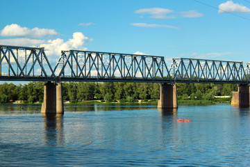 Podilskyi Railroad Bridge over the Dnieper river, built of steel trusses in 1929 (then Petrovskyi Bridge) in Kiev, Ukraine