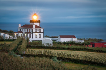 Fototapeta na wymiar Lighthouse at Ferraria, Farol da Ferraria, Açores, Portugal