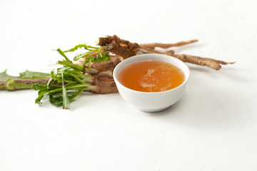 Chicory root (Cichorii intybi radix) with leaves and hot honey