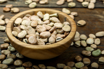 beans in a wooden plate