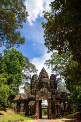 Angkor Wat gate surrounded by trees