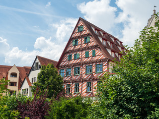 Residential house about Ulm city wall or, the town walls were built into the “raging waters of the Danube” as a defence against hostile armies small island (insel) in Danube river, Ulm.