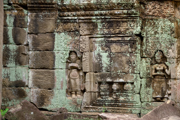 Fototapeta premium Angkor Wat bas-relief stone carvings