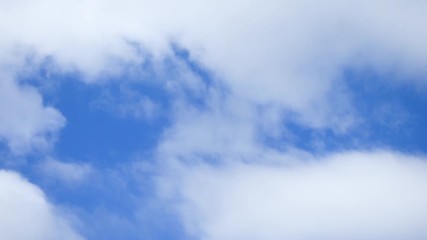 Clouds moved by the wind with blue sky on the background