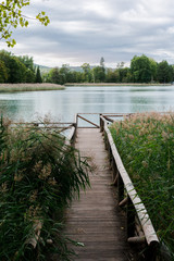 Landscape of a lake where appears a footbridge