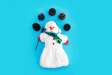 Christmas white snowman and toys balls and cones for the New Year holiday