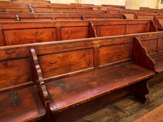 Old wooden bench in church 