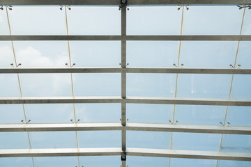 Interior metal frame grid glass roof background texture closeup