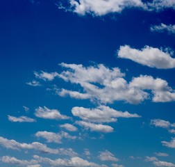 Naklejka na ściany i meble The white cloudscape in the bright blue sky
