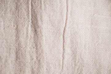 Linen textile surface close up. Selective focus.