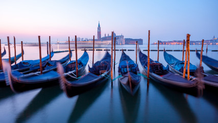 Sunrise at Venice with gondola and island of st george view from the square San marco © k_samurkas