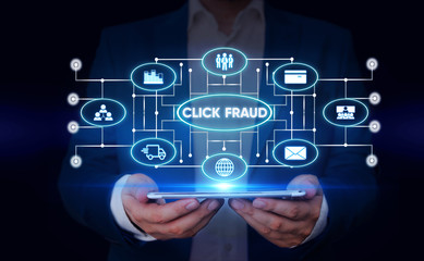 Writing note showing Click Fraud. Business concept for practice of repeatedly clicking on advertisement hosted website Male wear formal suit presenting presentation smart device