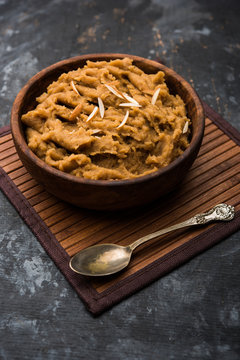 Wheat flour Halwa or Shira or porridge /  Atte ka Halva, Popular healthy dessert or breakfast menu from India. served in a bowl or plate. selective focus