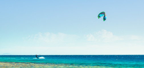 one surfer with a sail in the Red Sea in Egypt