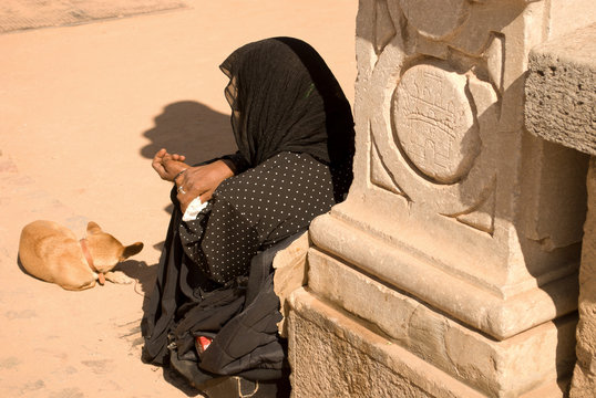 A Beggar Begs On The Road