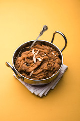 Wheat flour Halwa or Shira or porridge /  Atte ka Halva, Popular healthy dessert or breakfast menu from India. served in a bowl or plate. selective focus