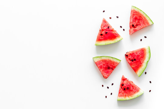 Slices of watermelon on white background top view mock up