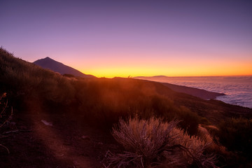 Beautiful colors dawn sunset time at the mountains - beauty nature outdoor in national park with vulcan in background and coloured sky