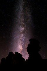 Night landscape with the Milky Way. Beautiful nature outdoors with stars and colors in the sky