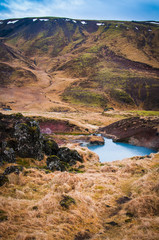 Scenic volcanic landscape with geological formations in Island 