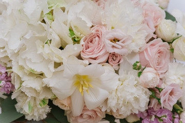Range of wedding flowers. Beautiful fresh flowers to decorate the wedding table and banquet hall in the restaurant.