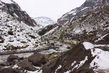 snowed mountain in Cajon del maipo, Chili. views of chilean andes mountains on winter