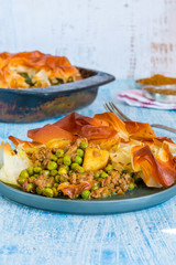 Lamb samosa pie - popular Indian dish with a savoury filling