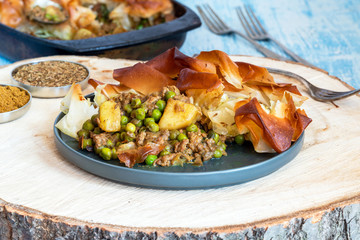 Lamb samosa pie - popular Indian dish with a savoury filling