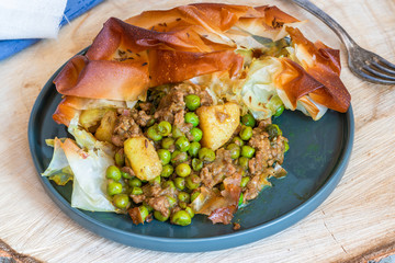 Lamb samosa pie - popular Indian dish with a savoury filling
