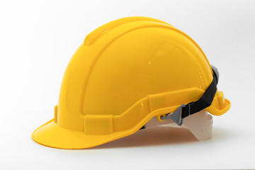 Yellow safety helmet side view  isolated on white background