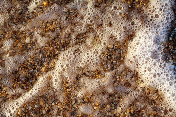 sea pebbles colored granite on the beach